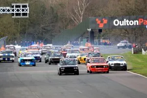 A group of cars on a racing course