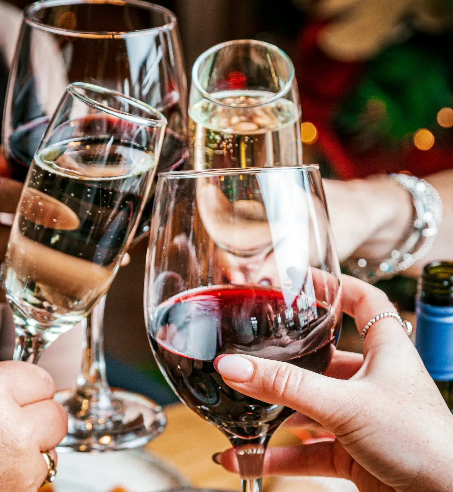 Clinking Wine glasses with wine in them
